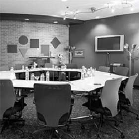 Black and White Photo of Meeting Room Table